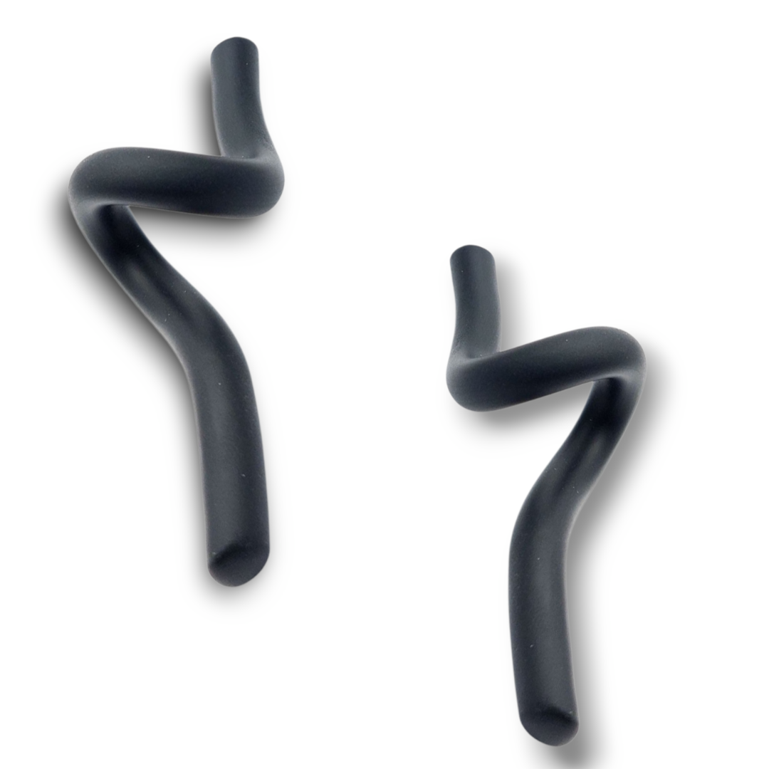 Two black silicone hose connectors on a white background