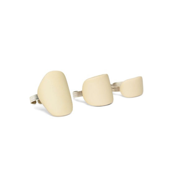 A set of three black polymeric clay rings with sterling silver 925 accents, displayed against a white background.