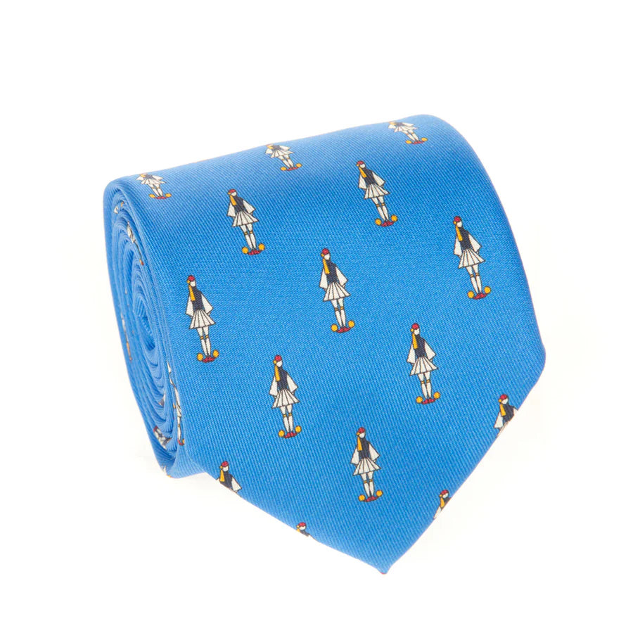 Blue tie with small printed pattern on a white background