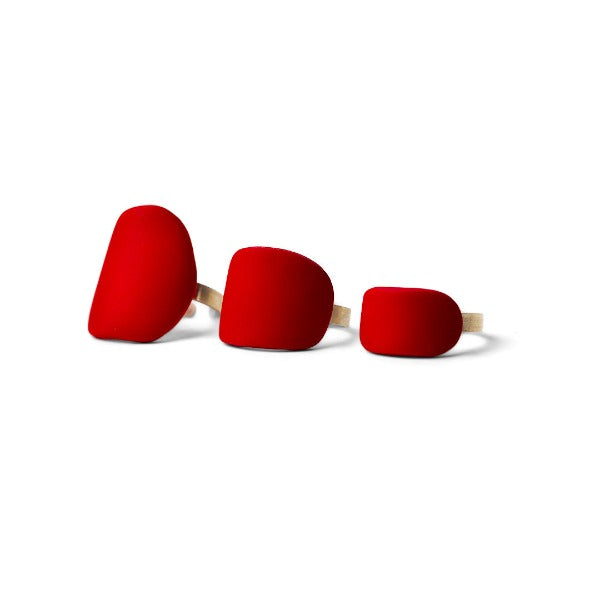 A set of three black polymeric clay rings with sterling silver 925 accents, displayed against a white background.