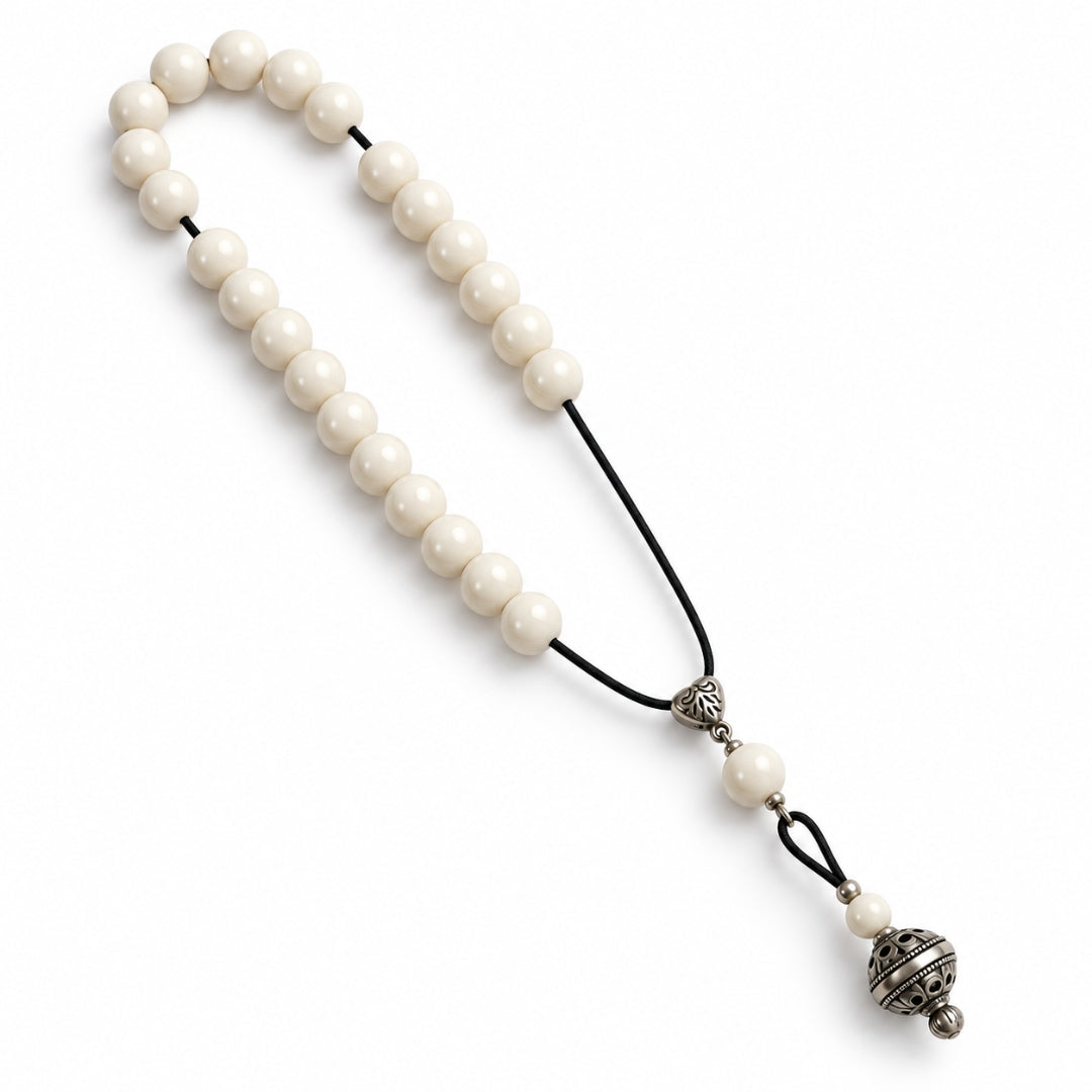 Ivory beads with silver pendant