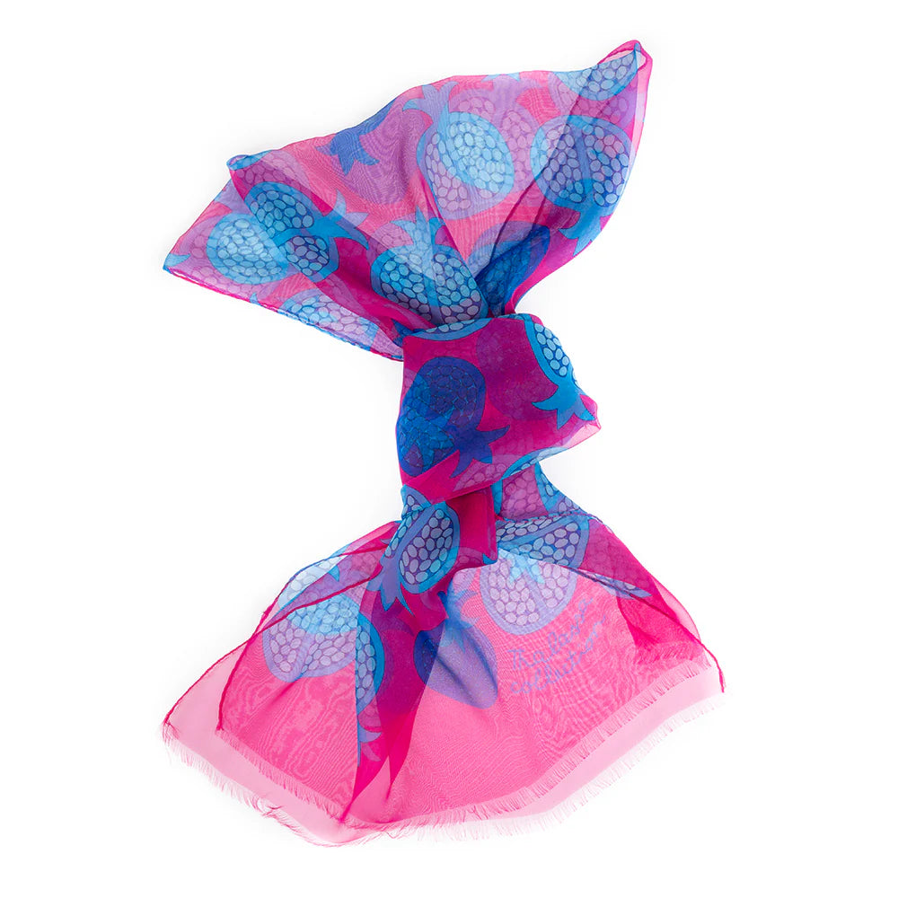 Pink and blue patterned scarf on a white background