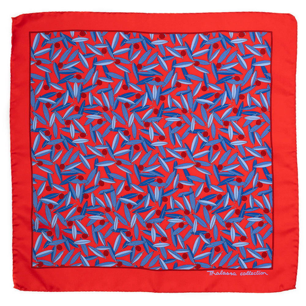 Red square scarf with blue geometric pattern, Maltese Collection branding.