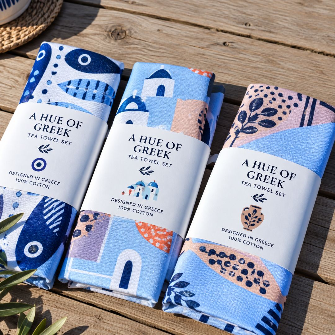 A Hue of Greek Blue cotton tea towels in paper wrap, packaging view | Thalassea