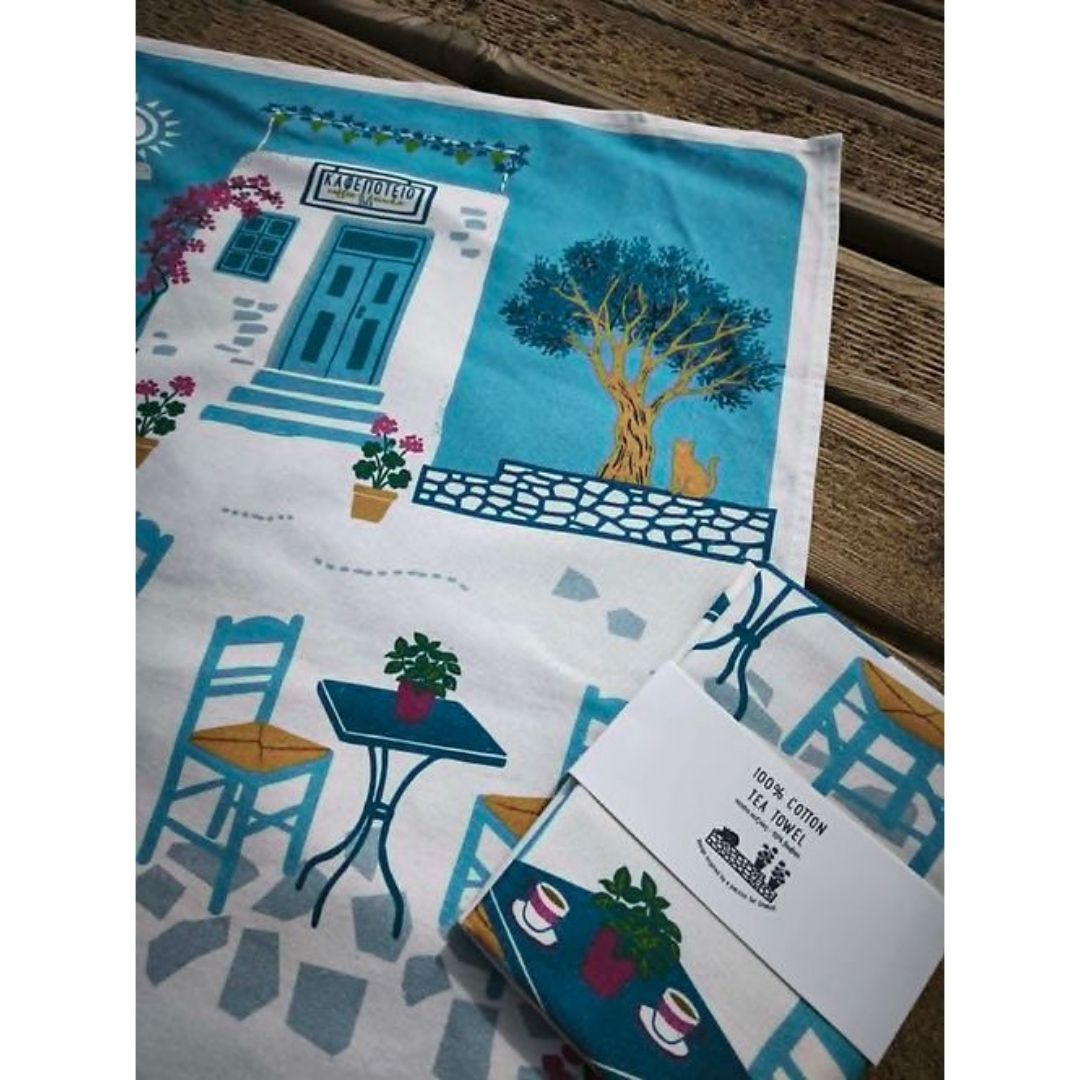 Coffee and Drinks Cotton Tea Towel – whitewashed coffeehouse, olive tree and cat print with card-wrapped towel, detail view | Thalassea