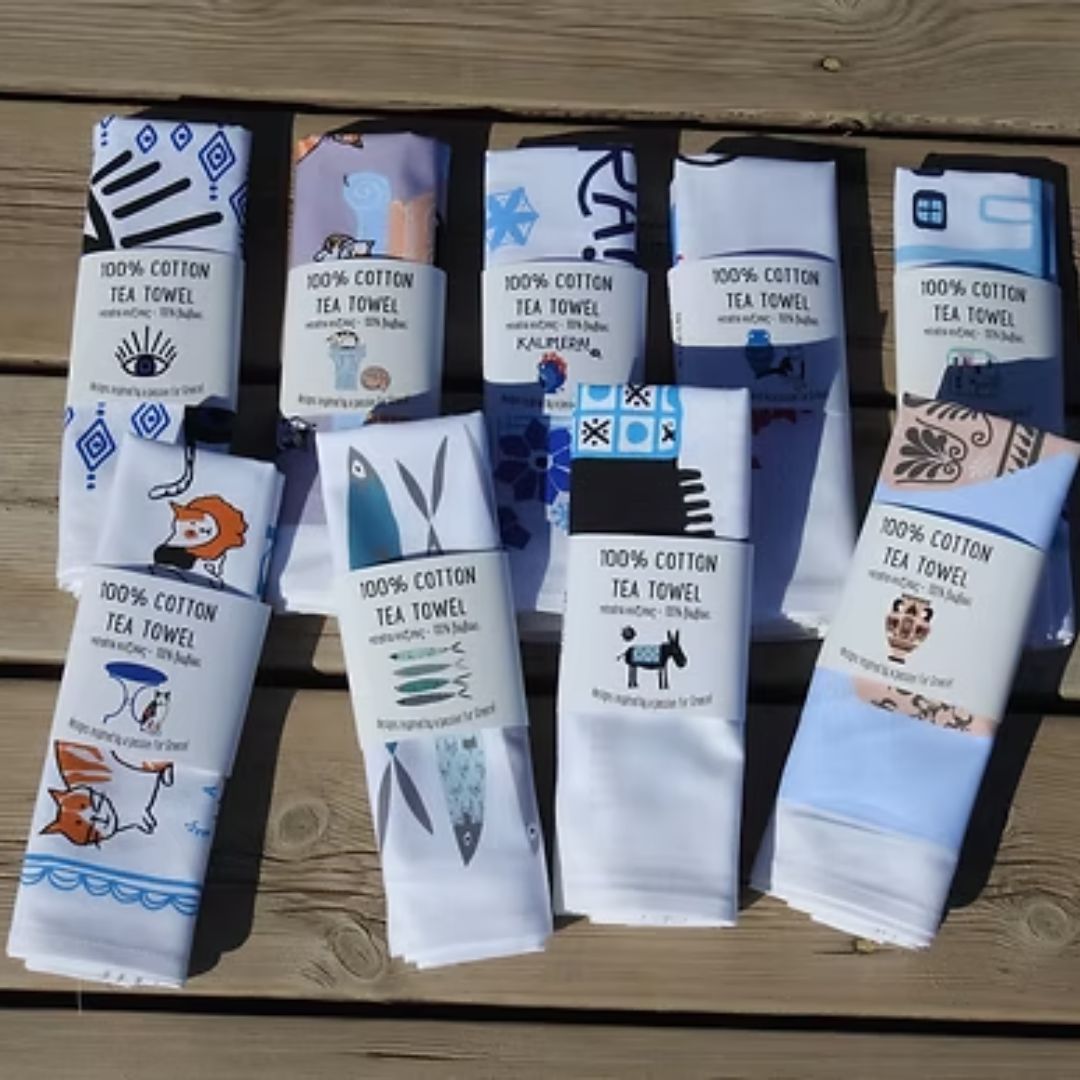 A Hue of Greek Blue cotton tea towels in paper wrap, packaging view | Thalassea