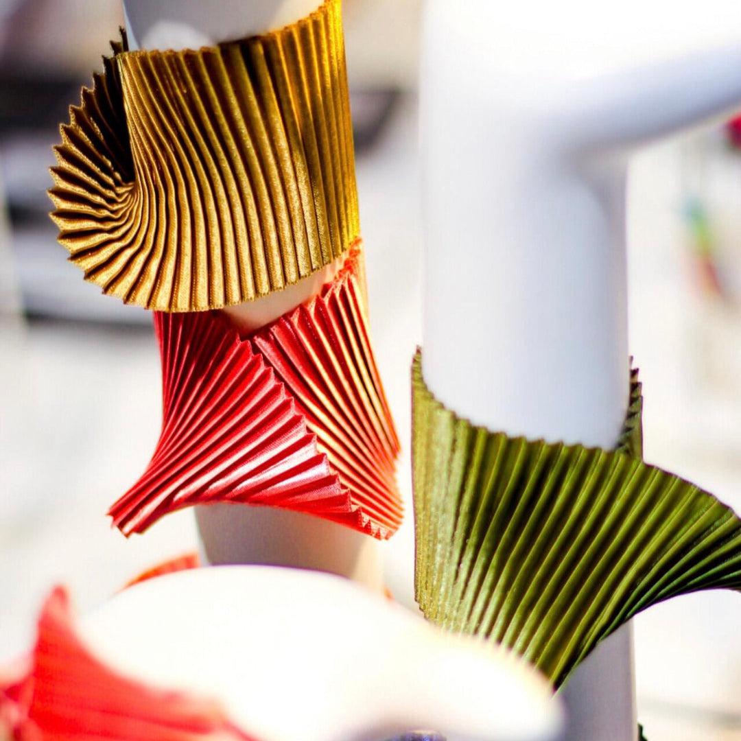 Close-up of colorful pleated shoes with a blurred background