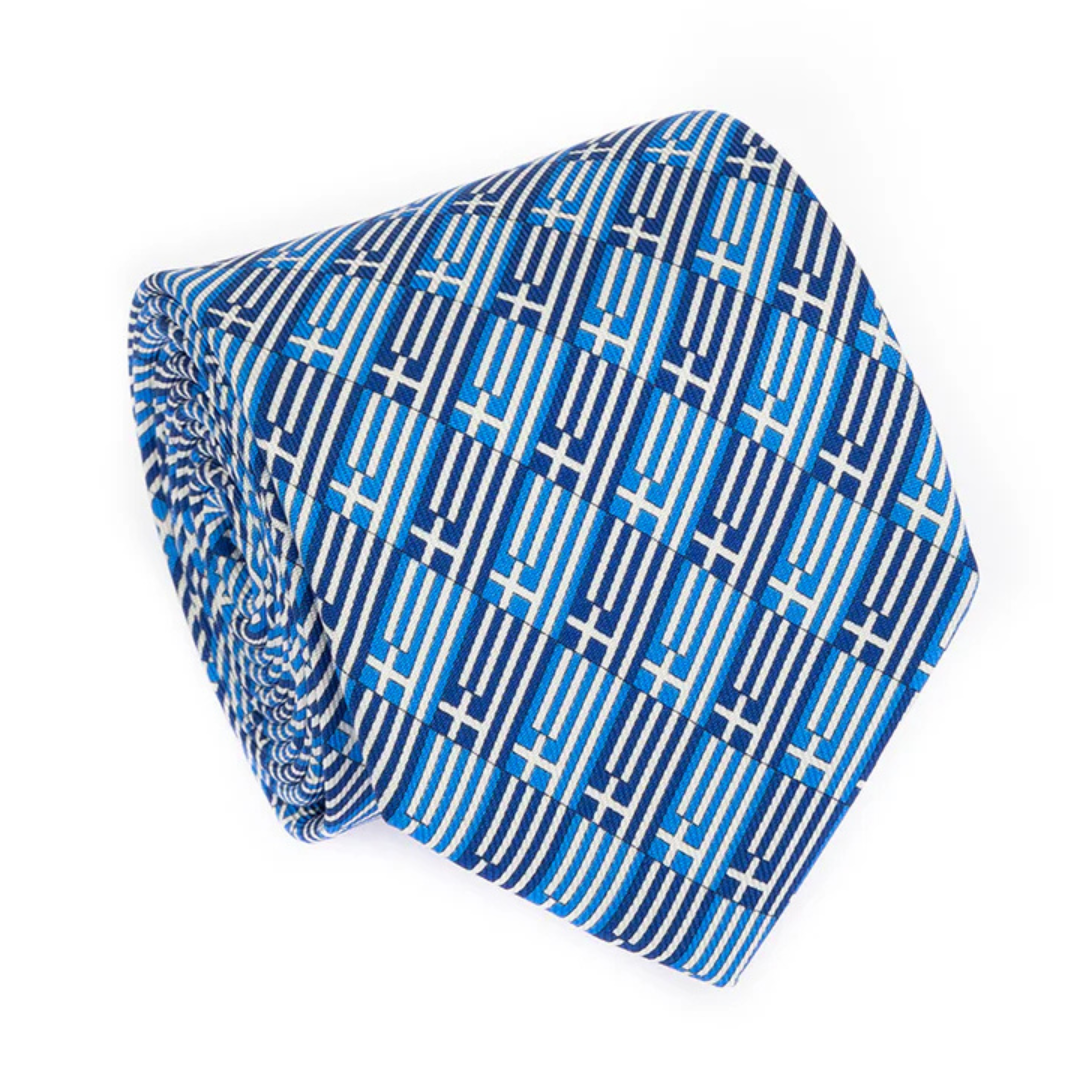 Blue patterned beanie on a white background