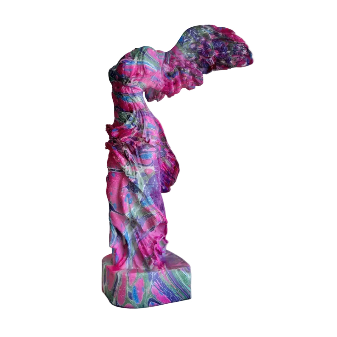 Colorful marble statue on a white surface with a light gray background