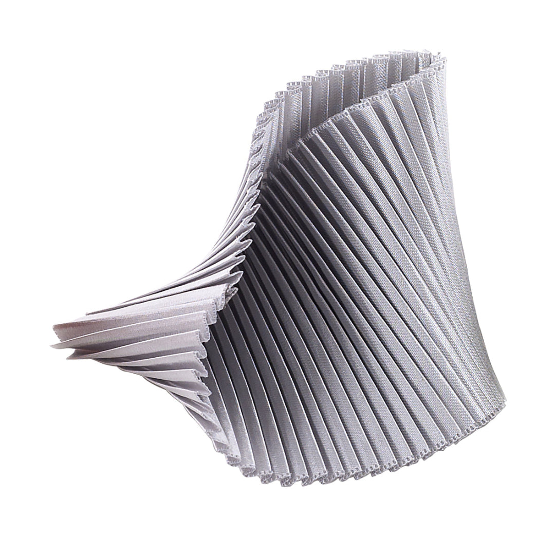 Stack of white pleated paper on a white background
