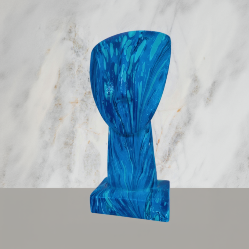 Blue marbled statue on a light gray background