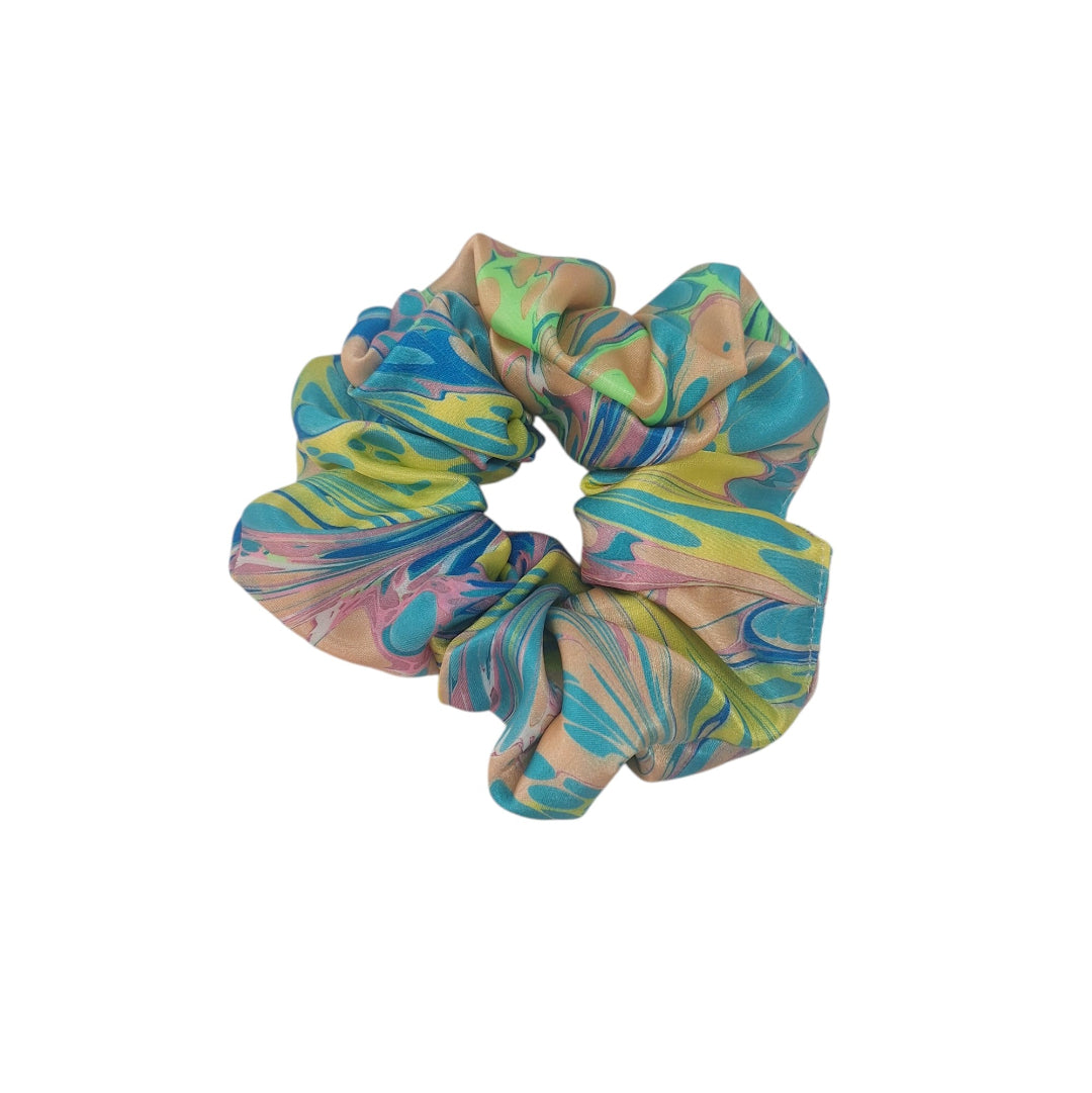 Multicolored marbled scrunchie on a white background