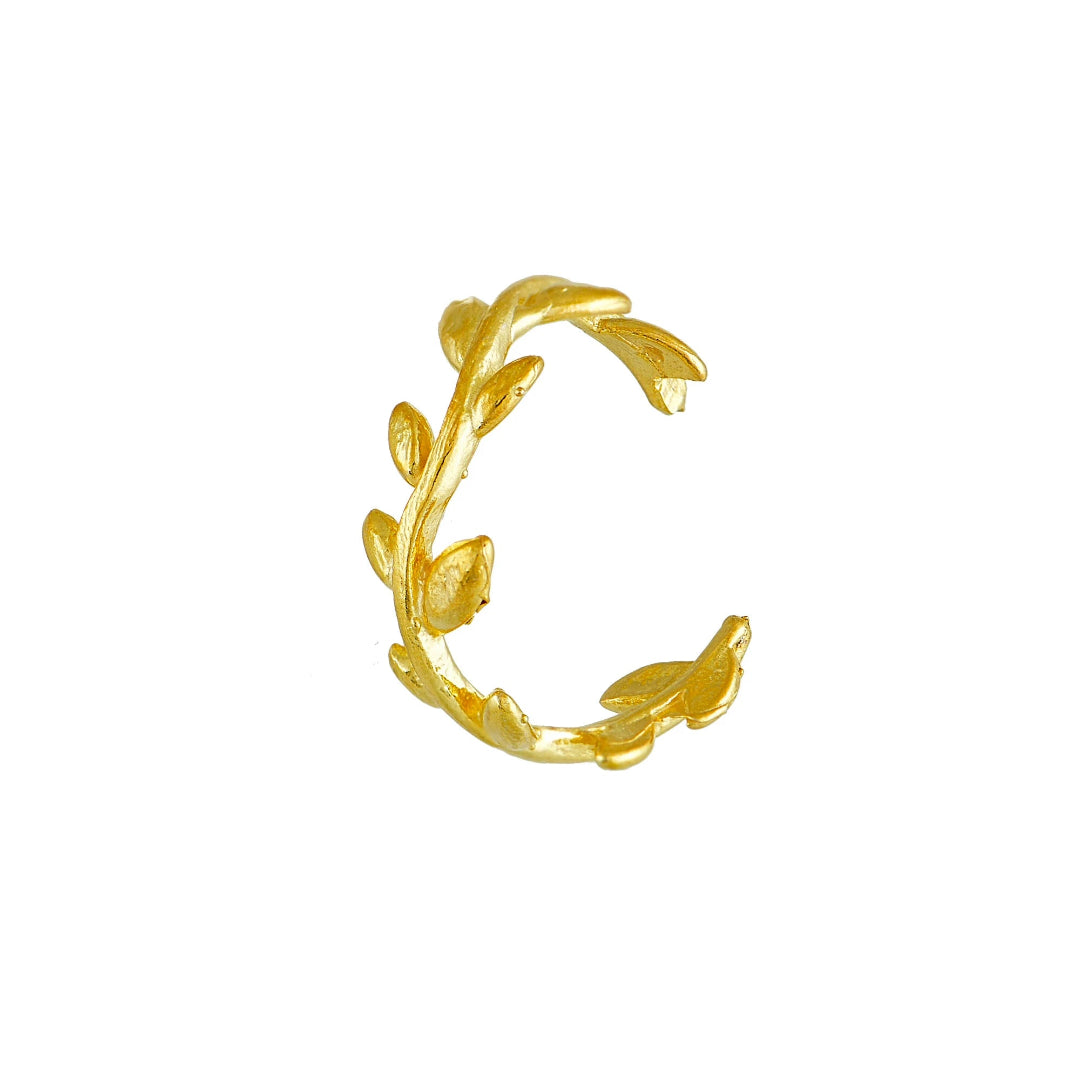Gold leaf-shaped earring on a white background