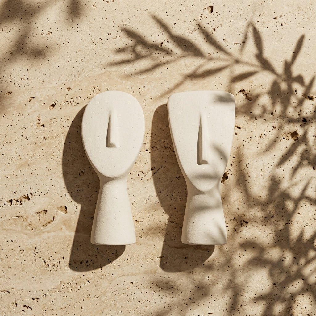 Close-up of Cyclades jesmonite pair by Ceme Deco – contemporary decorative set with painted stone texture