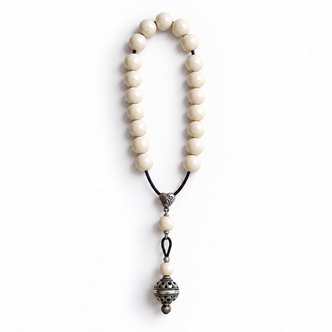Ivory prayer beads with silver charm