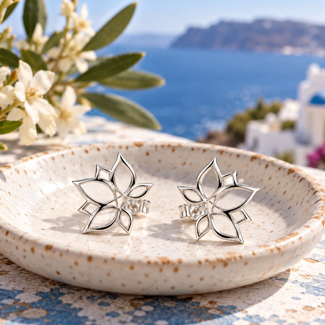 Woman wearing silver floral earrings