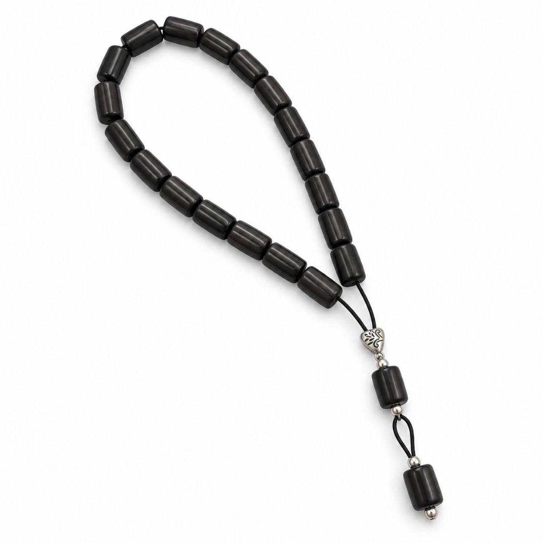 Black beaded strand with silver accent
