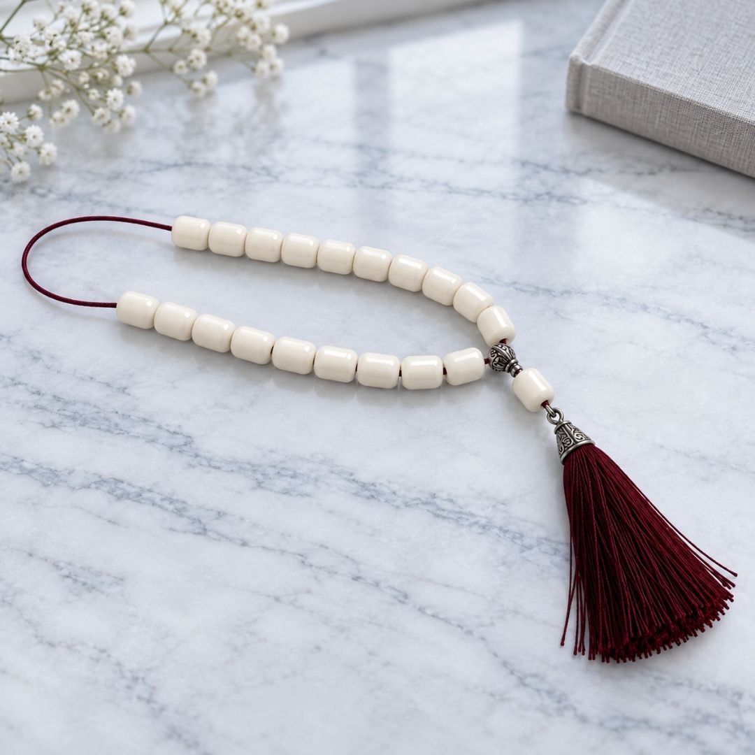 Ivory beaded strand on marble