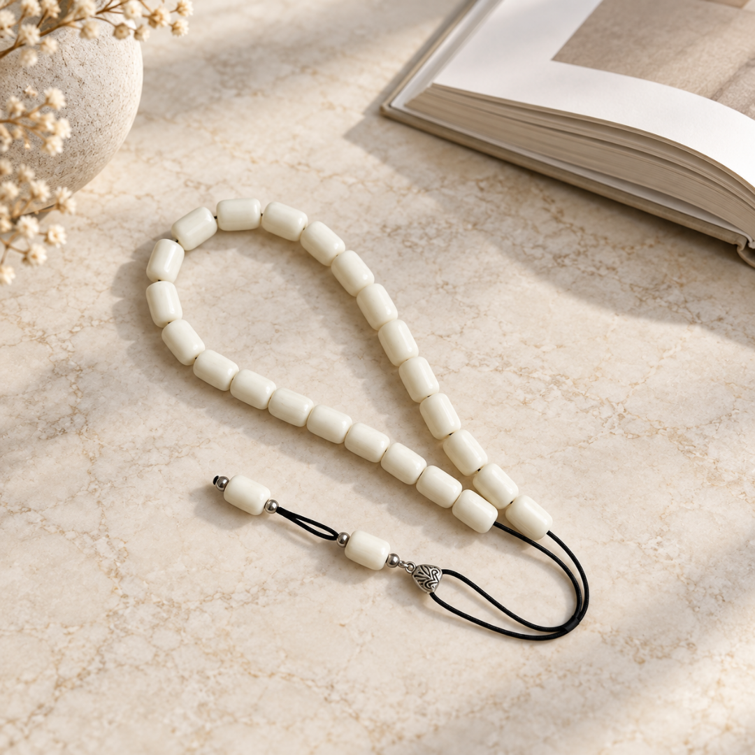 Ivory beaded strand laid vertically
