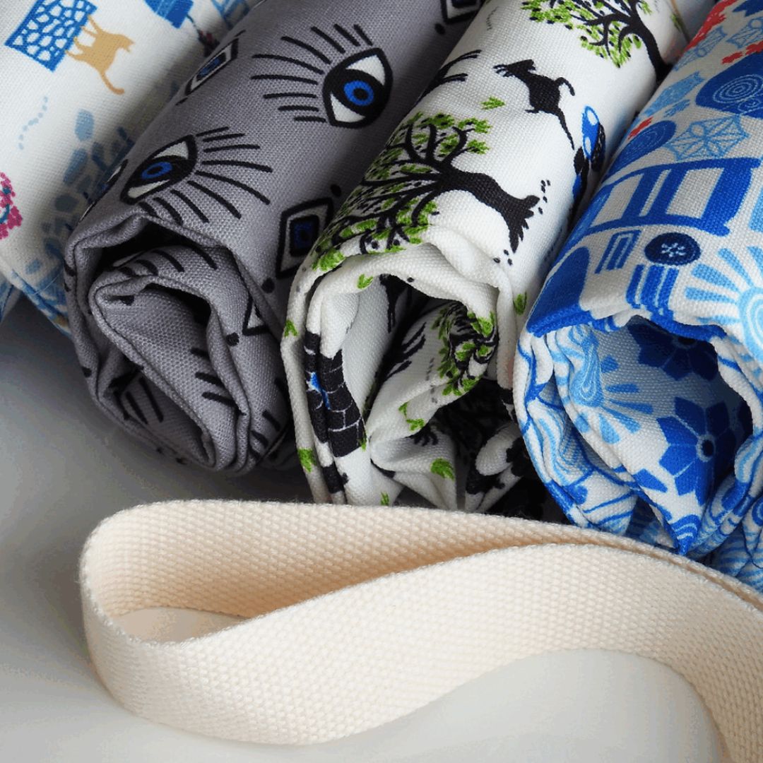 Rolled Greek print kitchen aprons