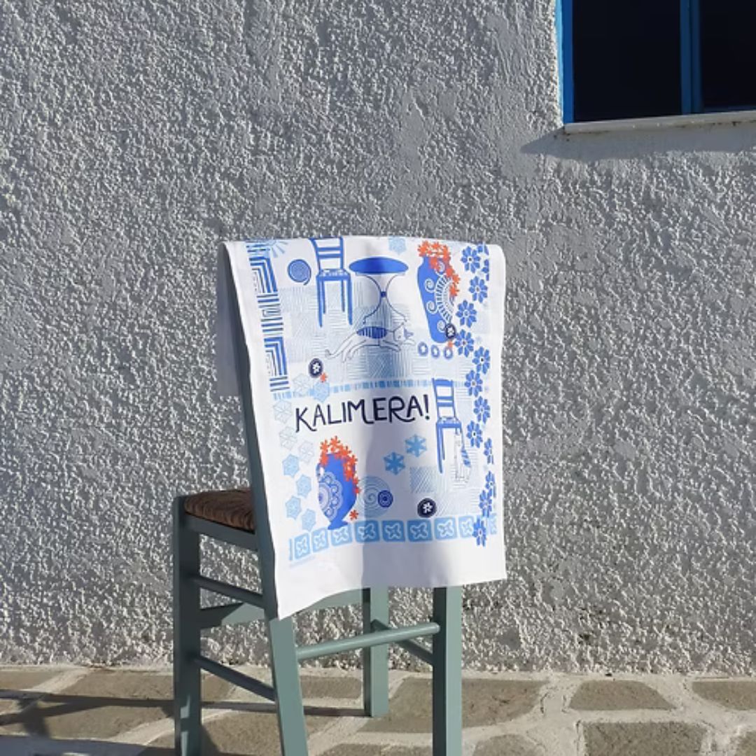 Kalimera tea towel on chair
