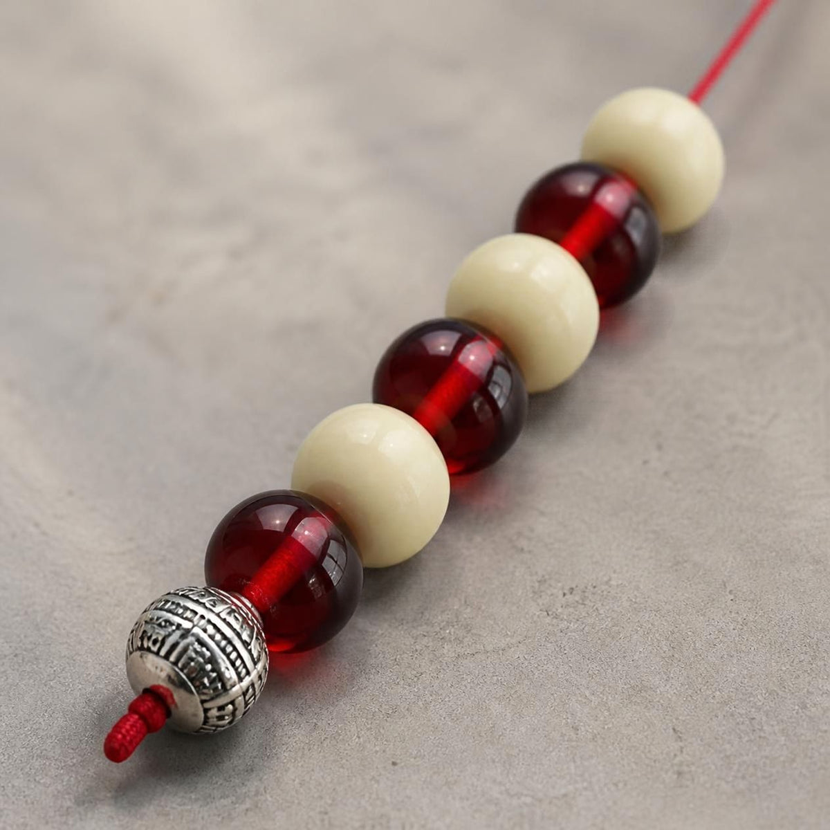 Red & Ivory Resin Beglery