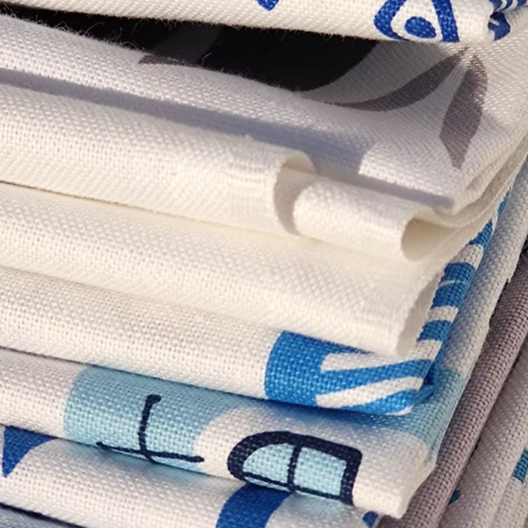 Folded Greek patterned tea towels