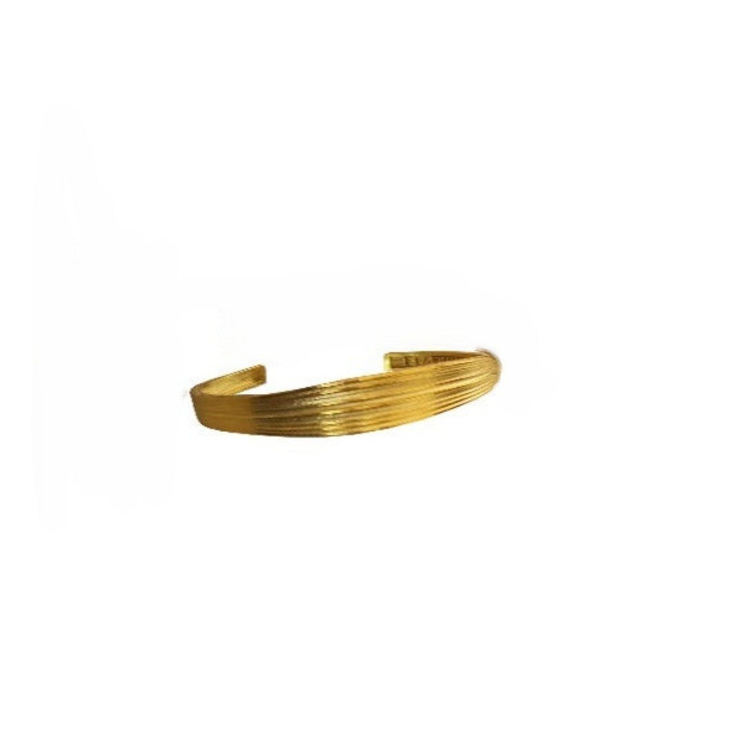 Gold bracelet on a white background