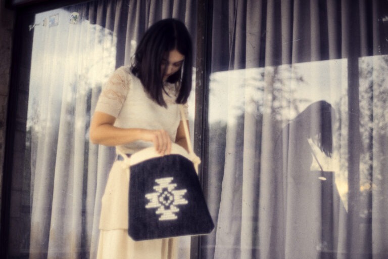 Tagari Thrace – handwoven Greek black cotton crossbody bag with ivory diamond motif, detail view | Thalassea