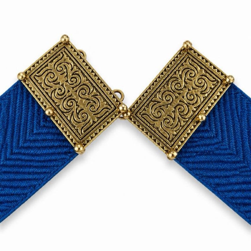Close-up of the Royal Blue Belt Byzantio ornate gold-tone buckle