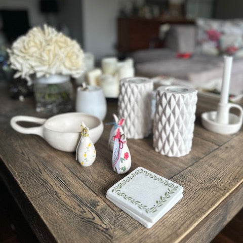 Decorative items on a wooden surface with a blurred background