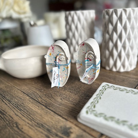 Decorative items on a wooden surface with a blurred background