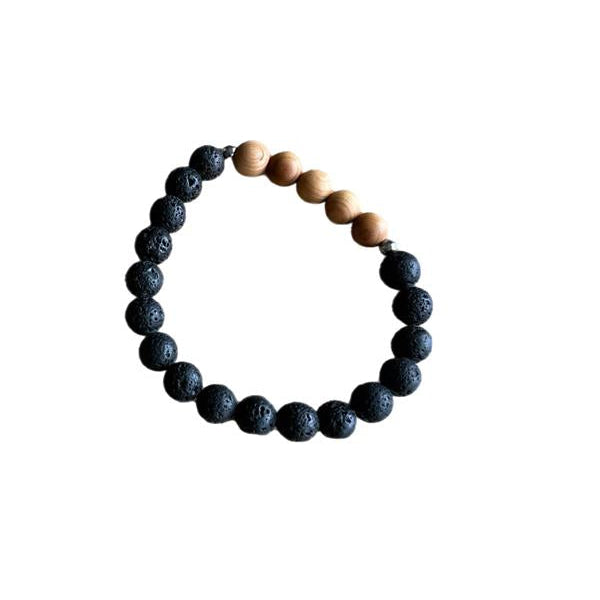 Bracelet with black and brown beads on a white background