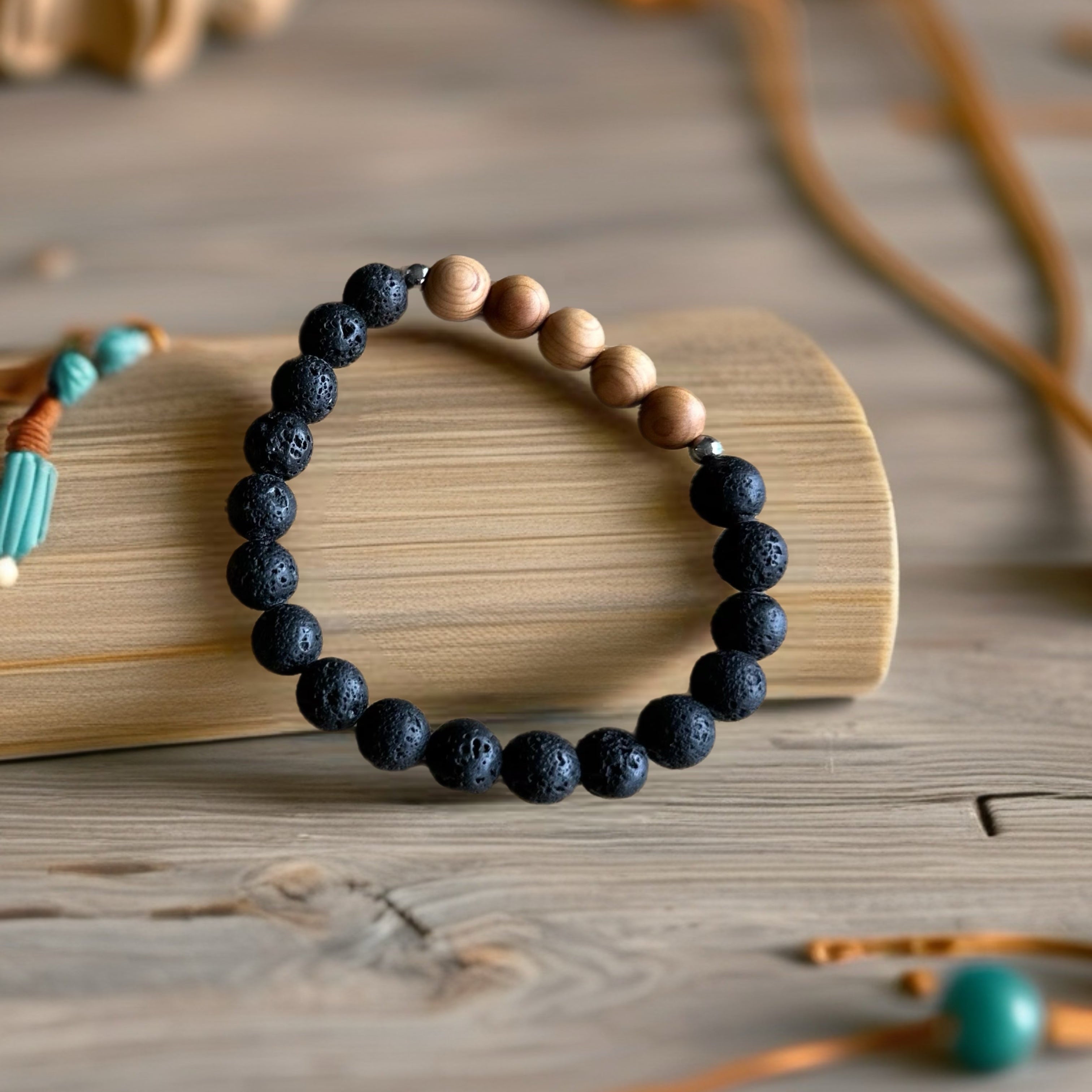 Bracelet with blue and brown beads on a wooden surface