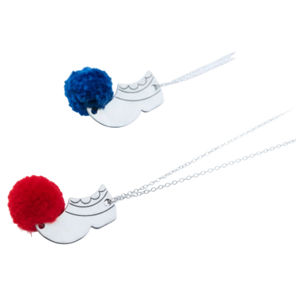Necklace with blue and black pom-poms on a white background
