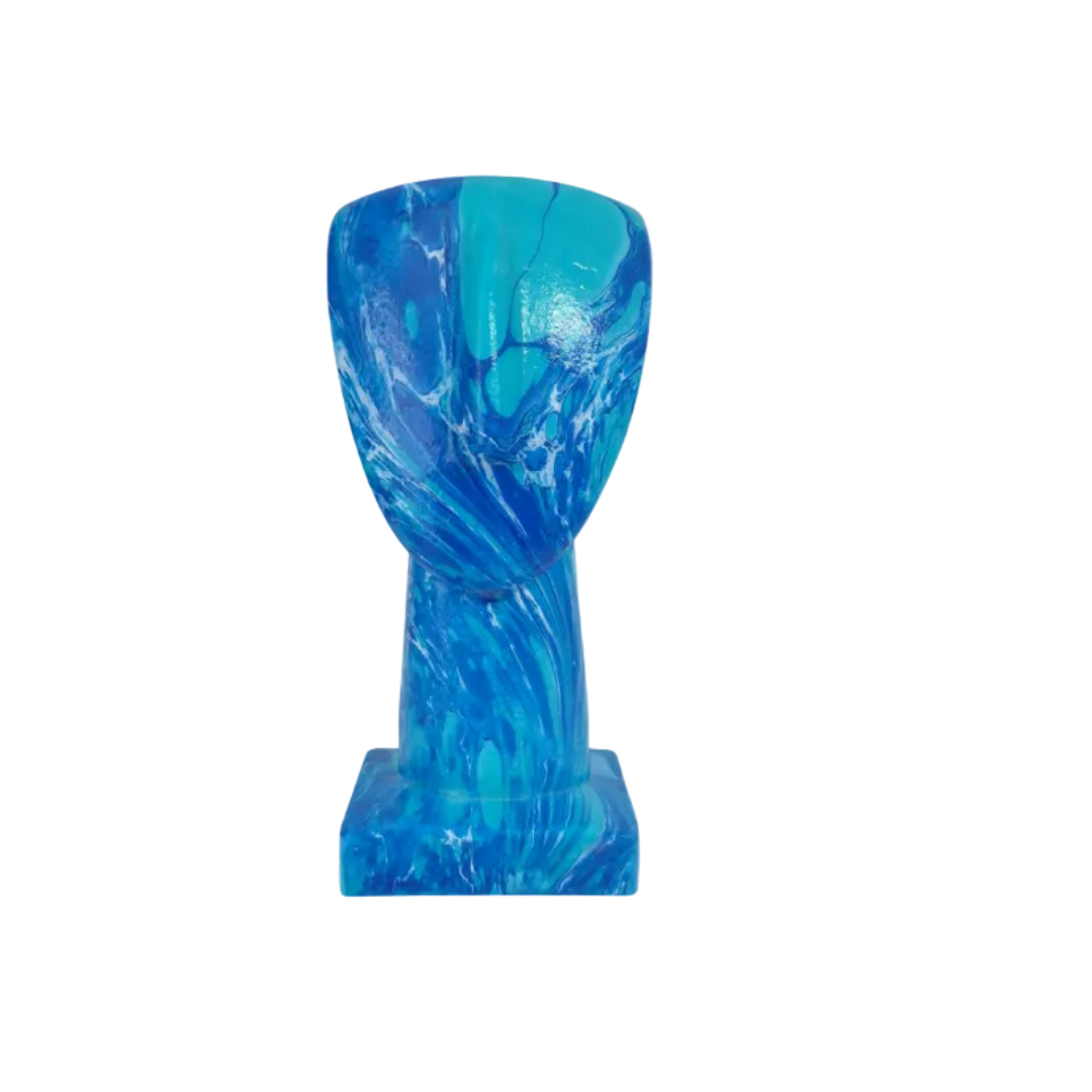 Blue and green marbled vase on a white background
