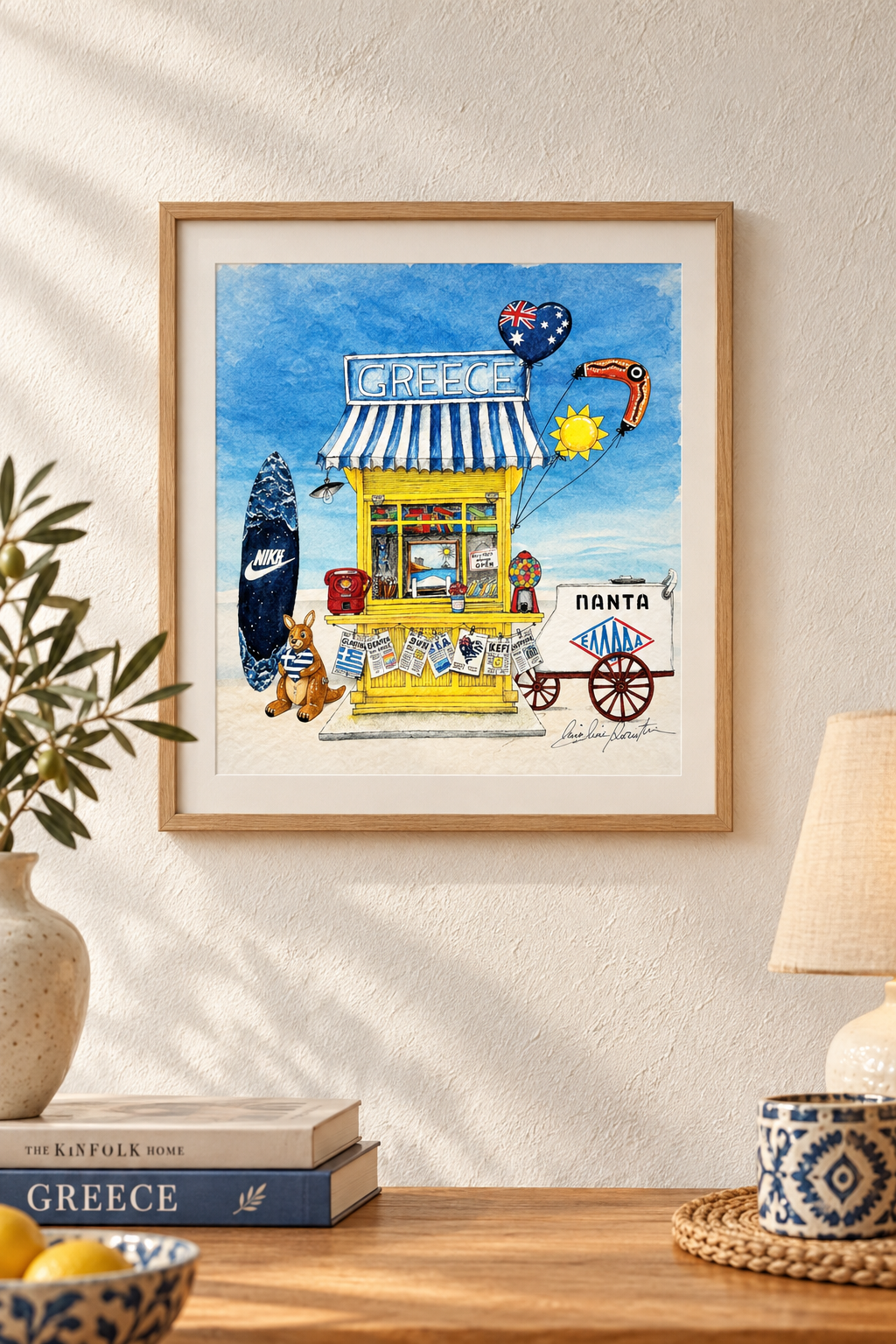 GR AUS Kiosk (Small Prints Collection) – Greek-Australian art print by Caroline Rovithi, framed above a sideboard with olive branch, styled | Thalassea