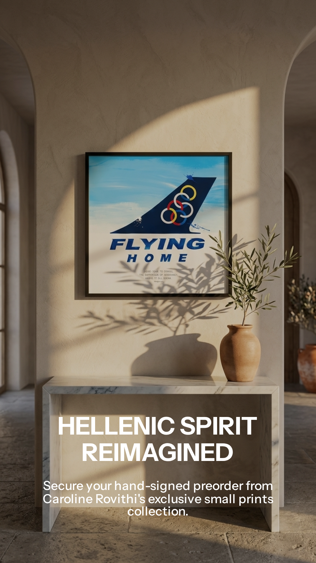 Framed artwork with 'Flying Home' text and Olympic rings on a wall in a room with a plant and vase.
