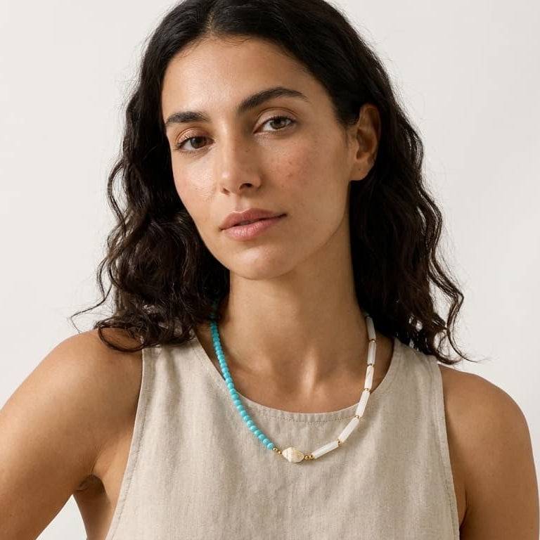 Thalassa Necklace – turquoise and white shell beaded necklace worn with a linen top, styled | Thalassea